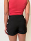 Black Shorts With Button Detail