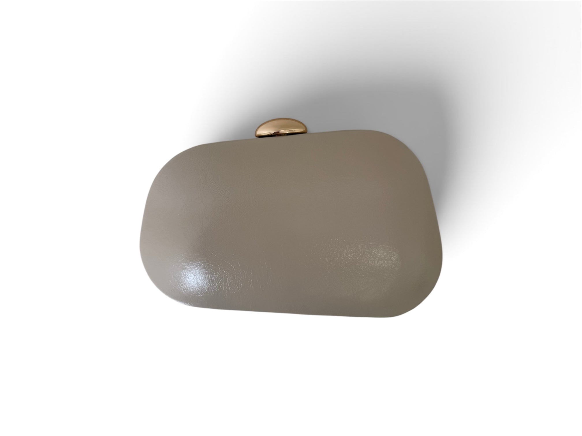 Asymmetrical Clutch Cream