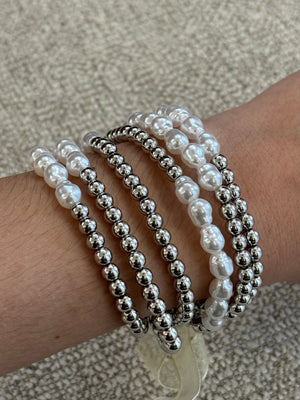 
            
                Load image into Gallery viewer, Pearl Silver Stretch Stack Bracelet
            
        